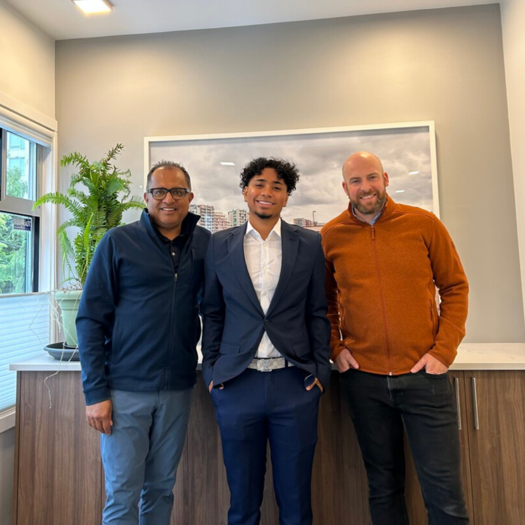 Randy Garg (left) stands with Beedie Luminary student Aaron Abay (middle), next to Noah Shipman (right).